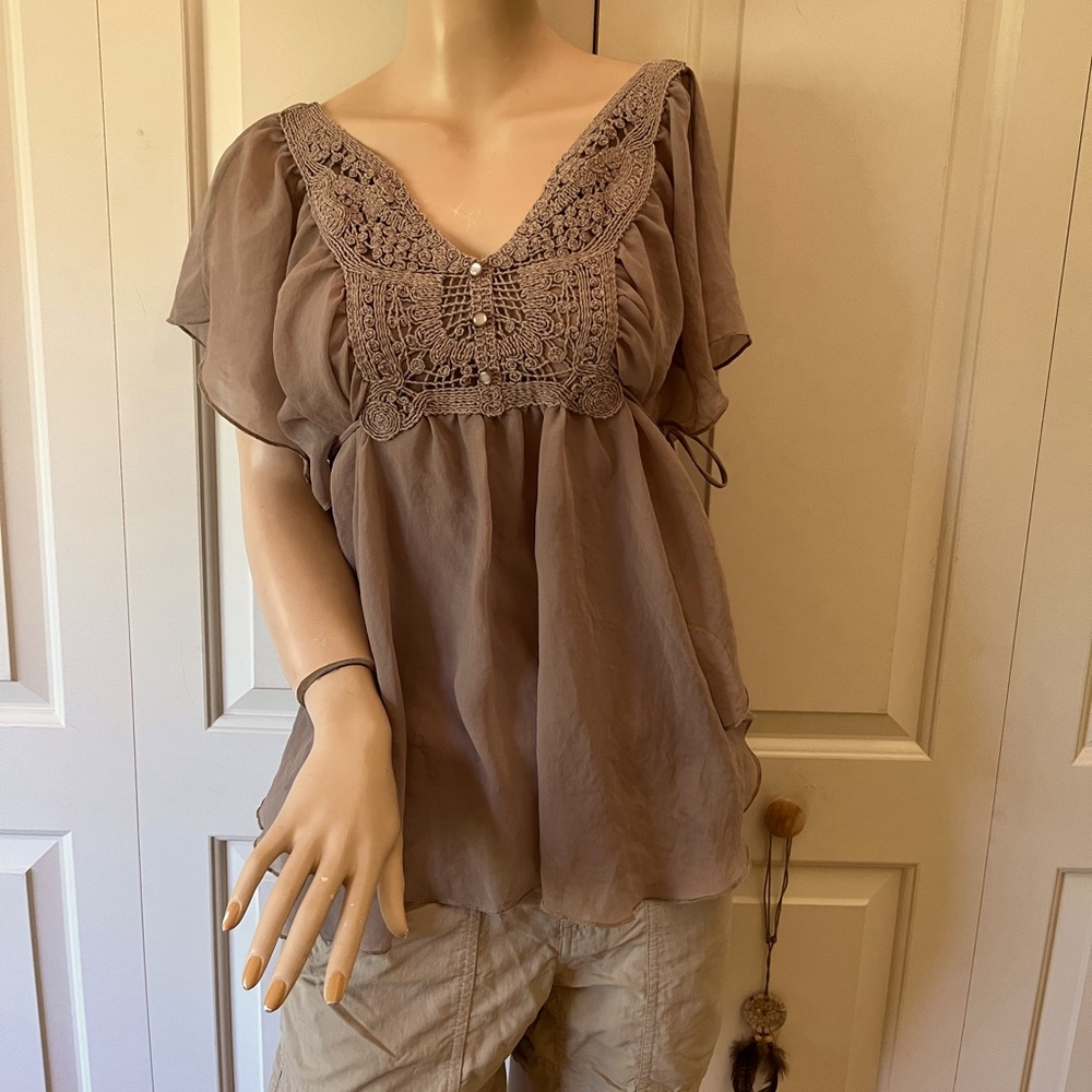 Beautiful flowy crochet top with chiffon sleeves and side ties